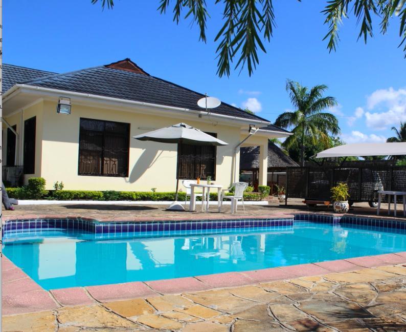 Idc Guest House Багамойо Экстерьер фото